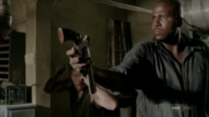 Daryl-stalking-a-prisoner-with-a-knife-on-The-Walking-Dead-300x168