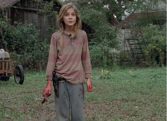 Lizzie took a knife on the Walking dead and killed her sister Mika